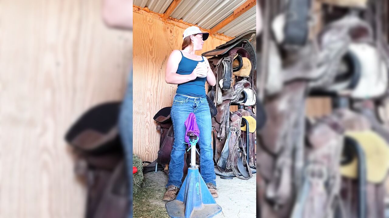 Redhead Rides BBC Dildo on Farrier Stand in Ass and Pussy Squirting