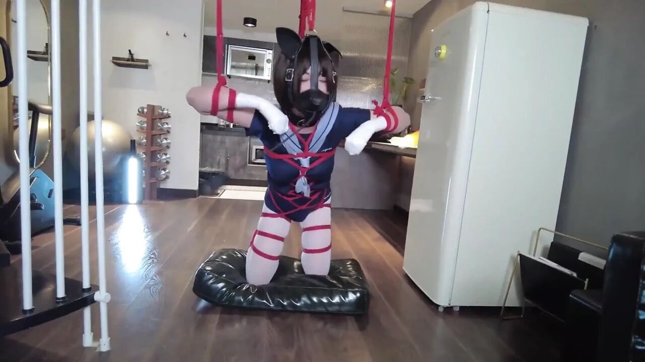 Mz31 - a Girl Tied and Suspended by a Red Rope Reaches Orgasm.