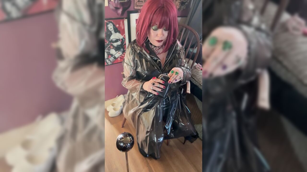 PVC Clad In Her See Through Coat Miss Tina Snua Smokes A Cigarette For You