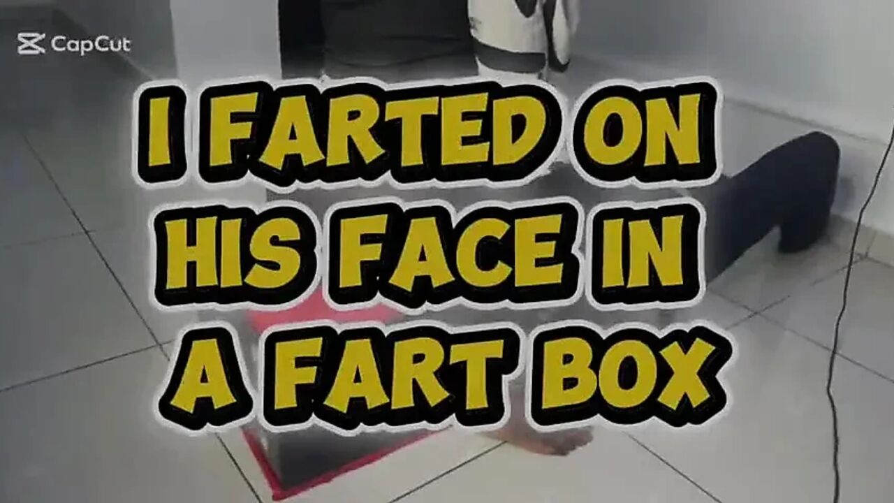 African Mistress Farts on His Face in a Fart Box