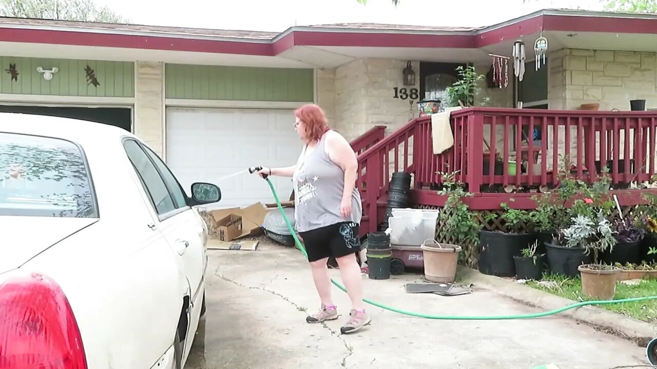 Sexy Mature bbw redhead Nurse Vicki washes her car!