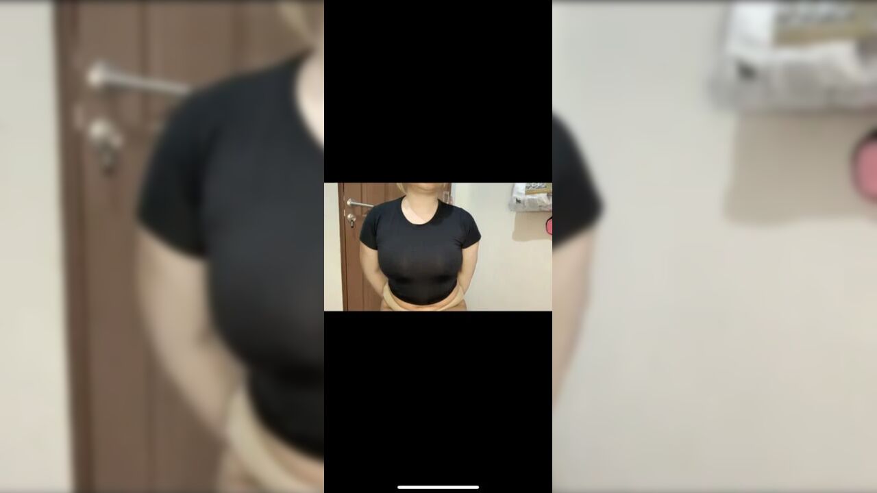 Sexy model shows off her body shape with protruding nipples