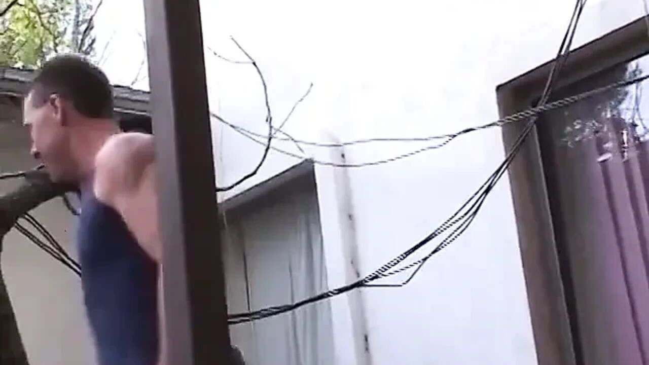 Blonde blows two men while getting penetrated from behind on a zebra couch