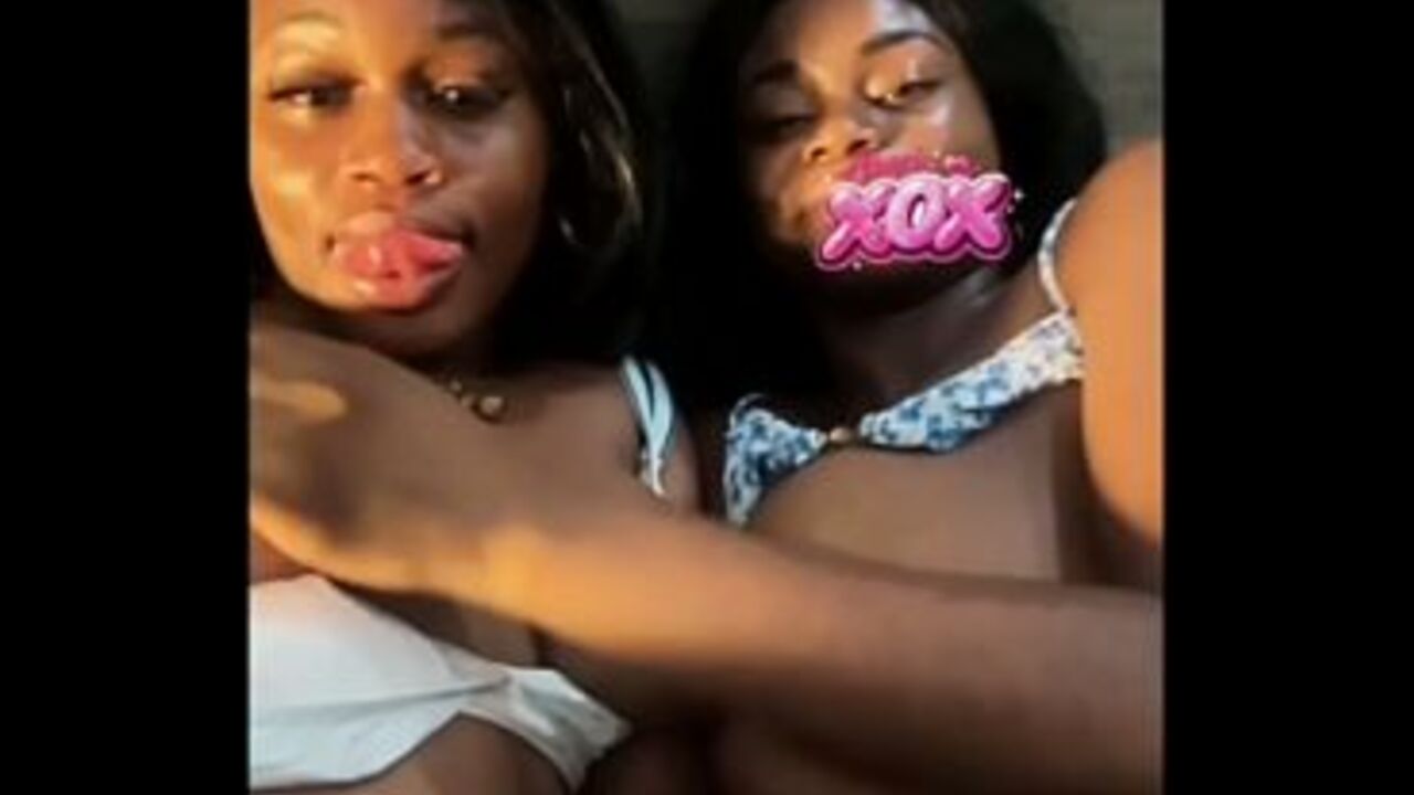 Pretty big tit African sisters Asari XOX and Skyla Koko lick each other's pussies
