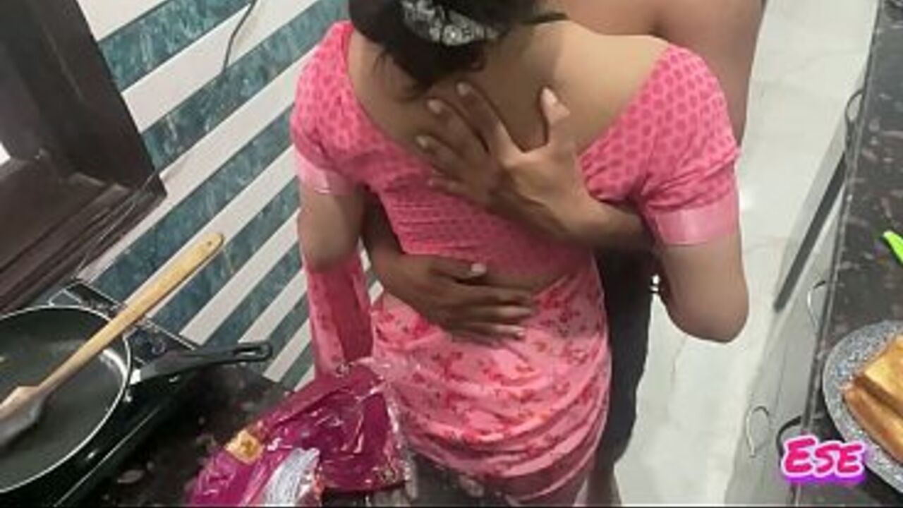 Desi Bhabhi's Sex While She Was Cooking Food in the Kitchen...