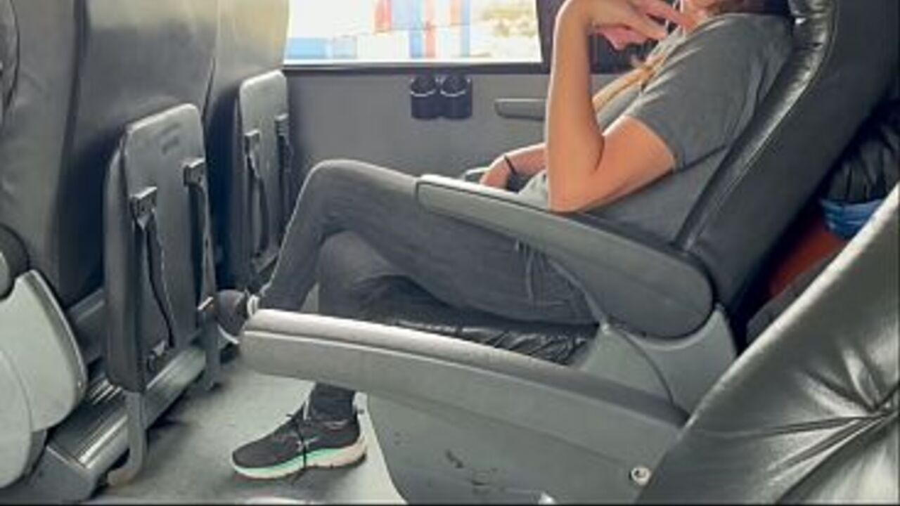 While traveling on the bus, I invite a stranger to suck my cock, and she accepts.